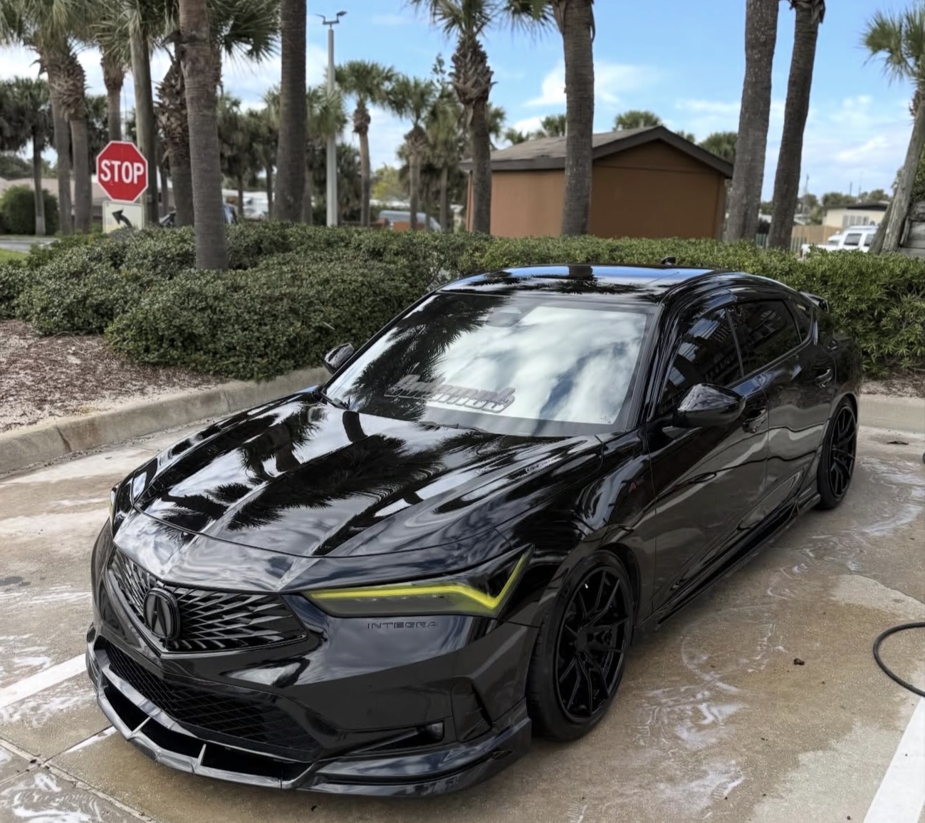 Black Acura Integra after detail - showroom finish
